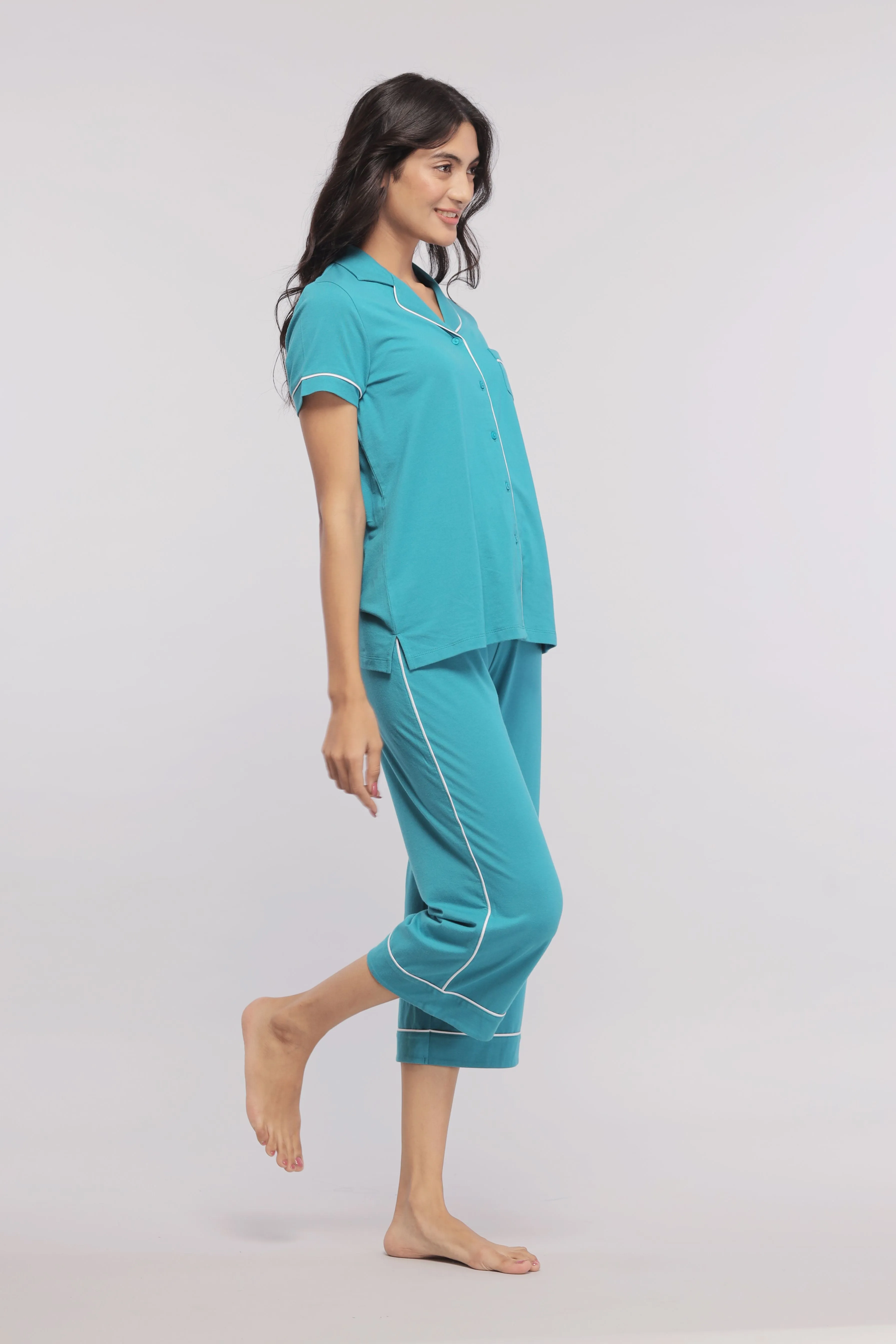 Teal Capris With White Piping