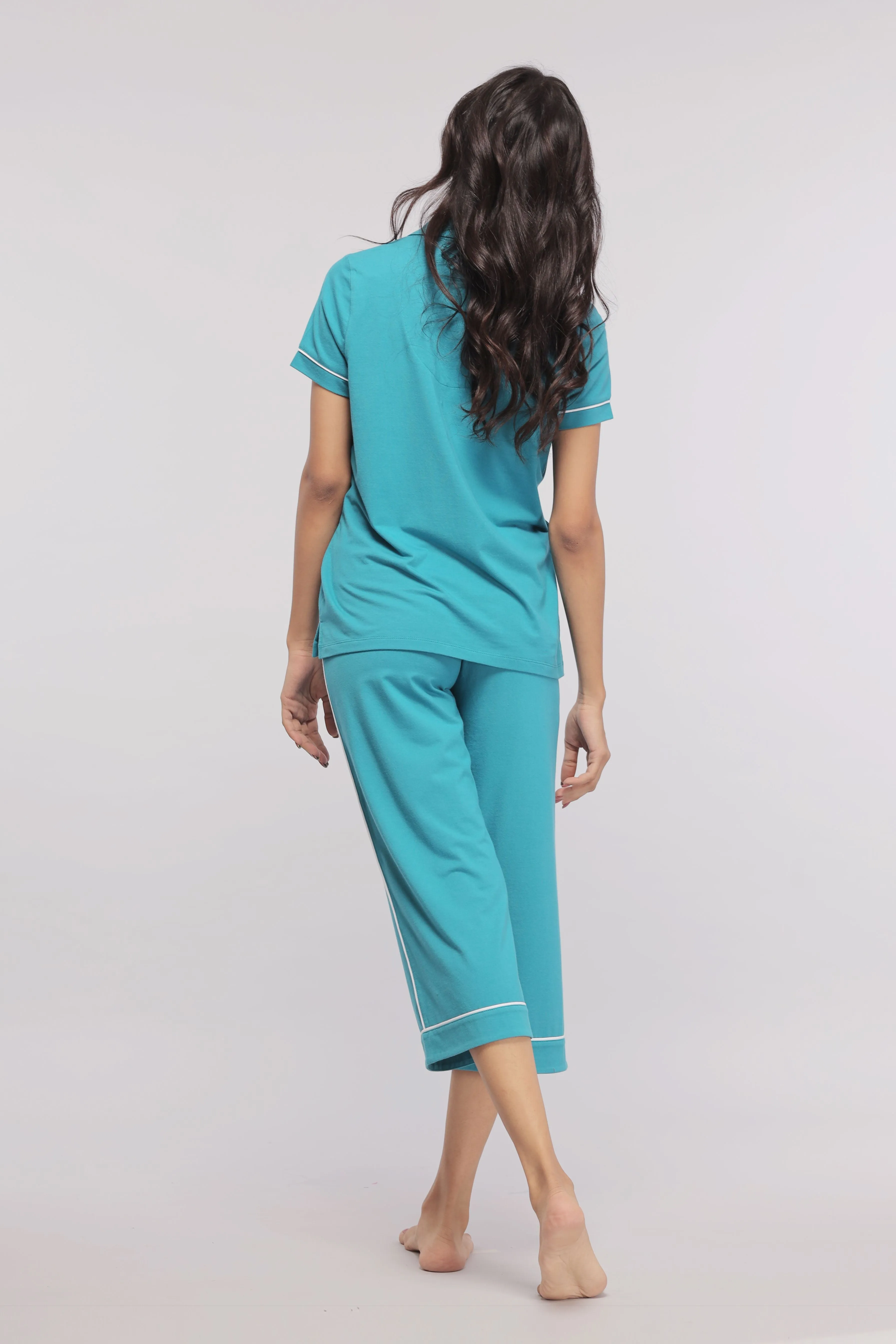 Teal Capris With White Piping